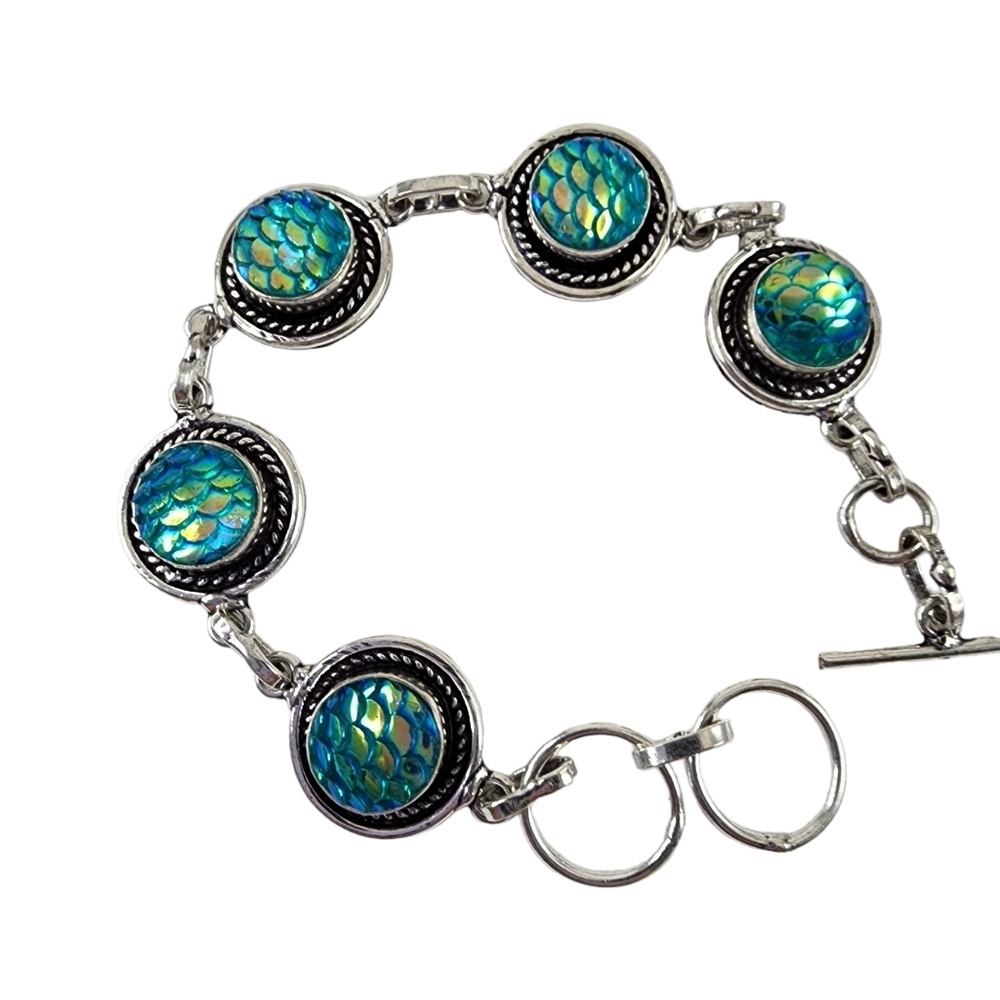 Mermaid bracelet green carved titanium set in silver overlay